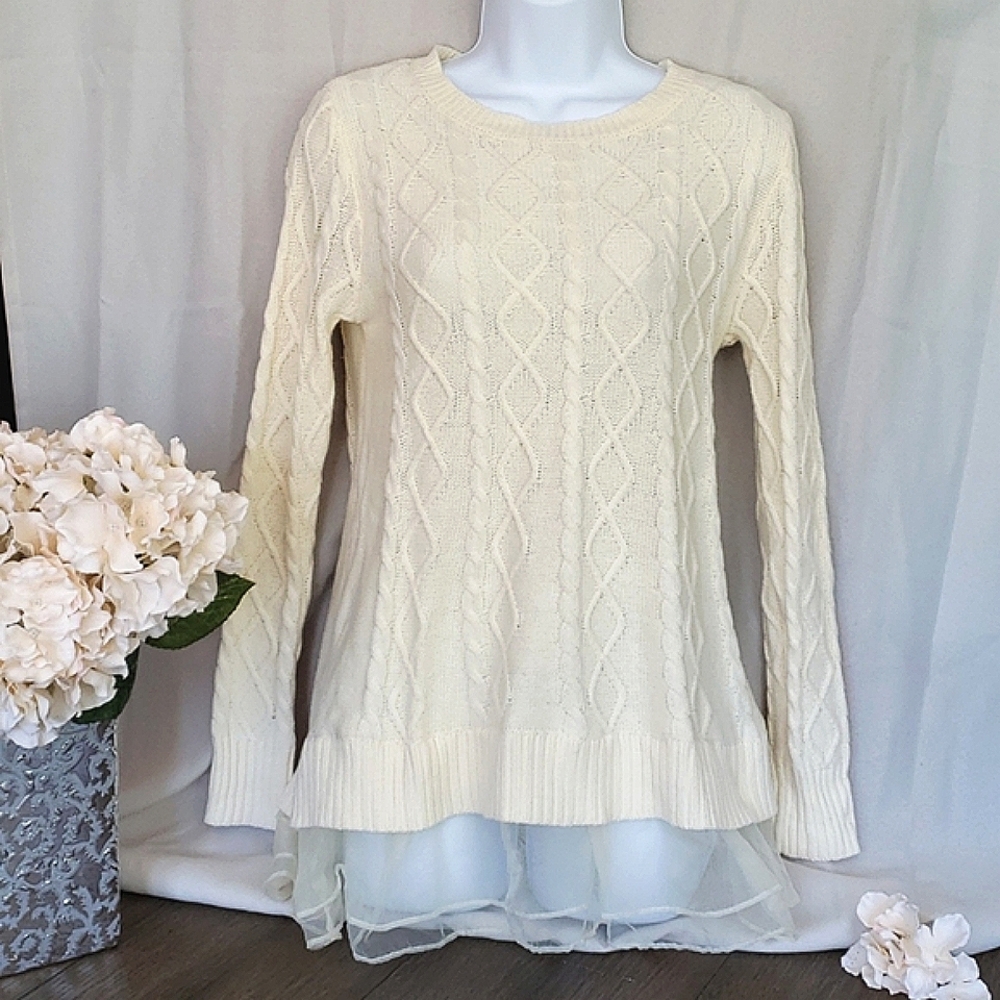 Cream sweater with frilly hem